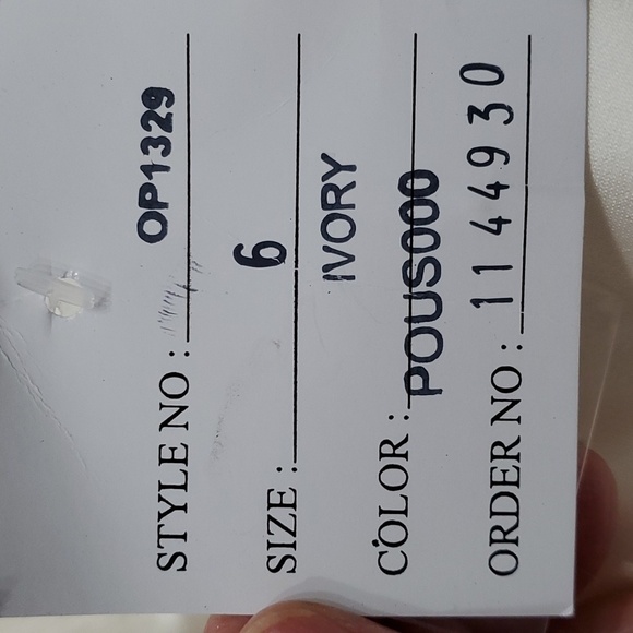 Wedding dress, David's Bridal, NWT. Size 6. Ivory lace and satin. Low V back. - Picture 14 of 16